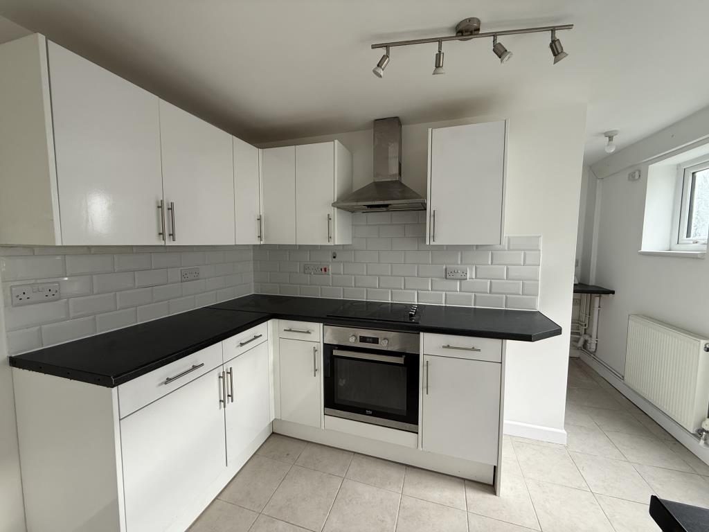 Lot: 157 - SEMI-DETACHED TWO-BEDROOM HOUSE FOR INVESTMENT OR OCCUPATION - Modern fitted white kitchen